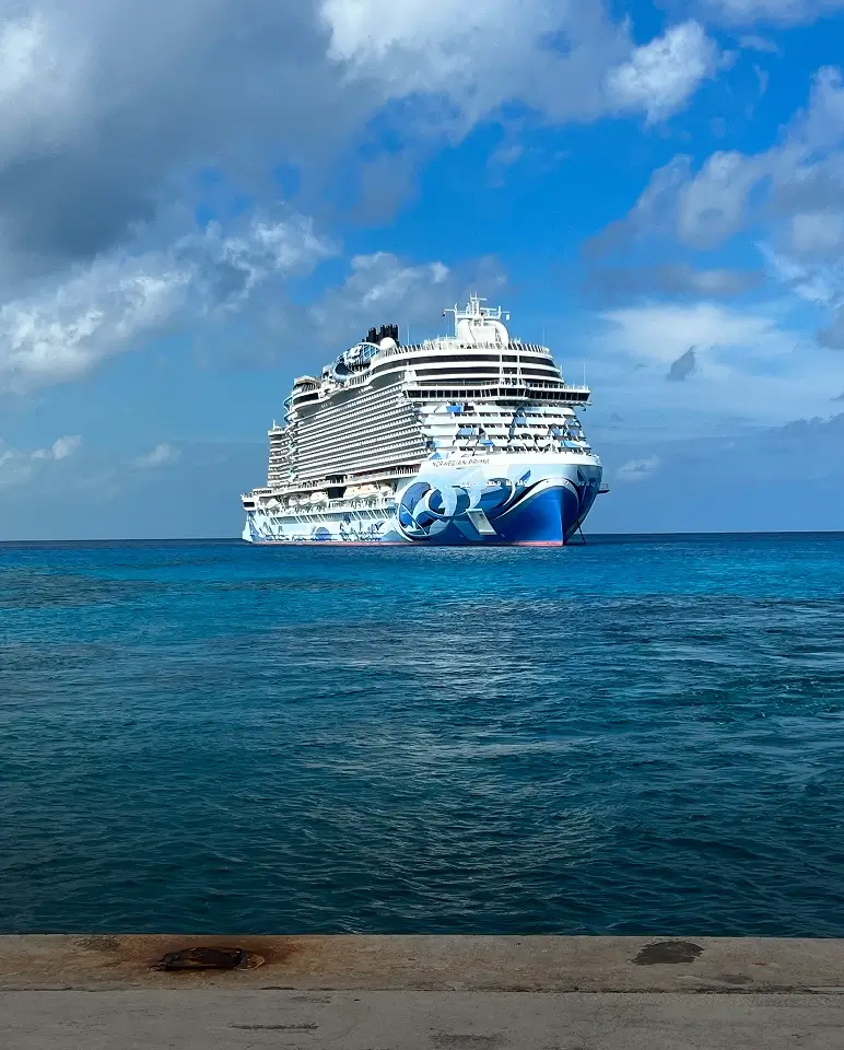 Cruise ship sailing on blue ocean